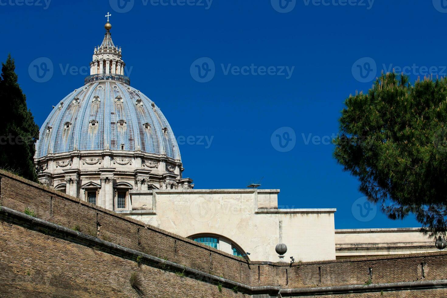 Dome of the Papal Basilica of St. Peter in the Vatican seen from the Viale Vaticano photo