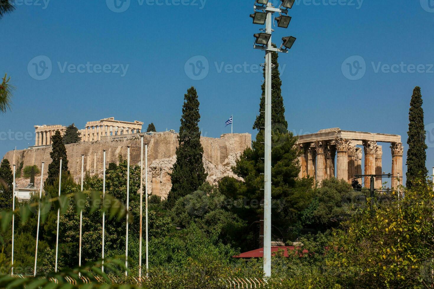 The ancient Acropolis and the Temple of Olympian Zeus at Athens city center photo