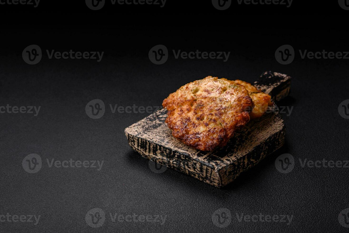 Delicious fresh fried minced chicken meat cutlets with salt, spices and herbs photo