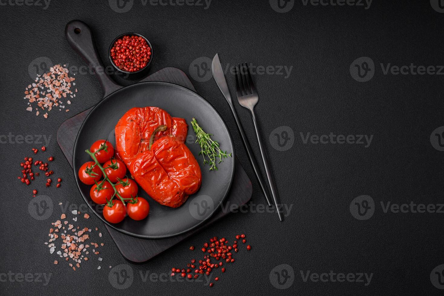 Delicious juicy grilled peppers with spices and herbs photo