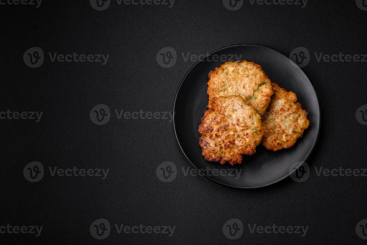 Delicious fresh fried minced chicken meat cutlets with salt, spices and herbs photo