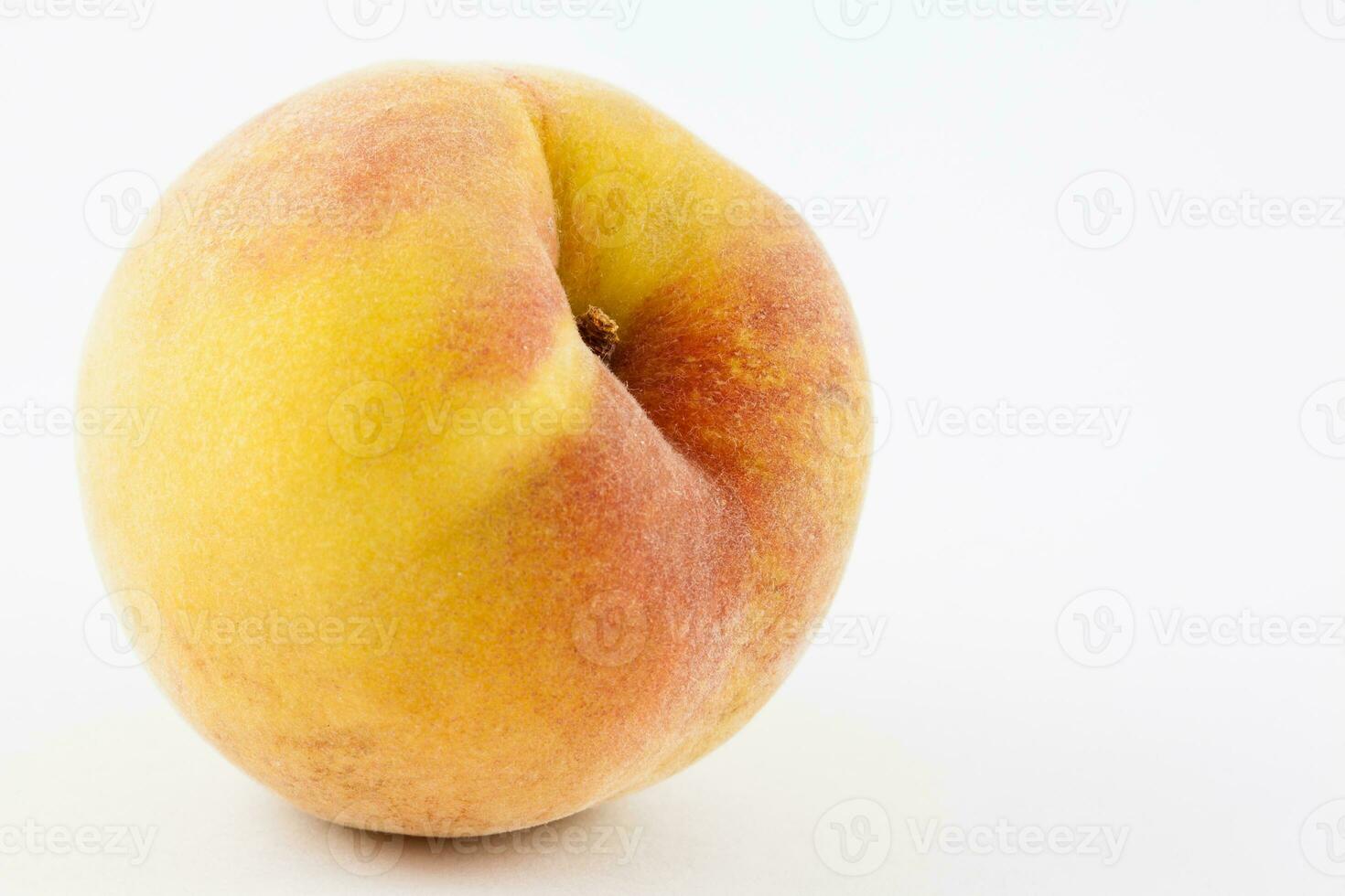 Peach isolated in white background. Prunus persica photo