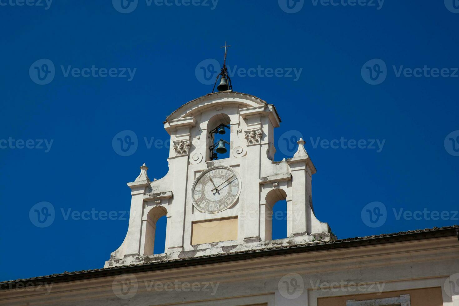 Clock and bell tower of the Salvatore Hospital in Piazza San Giovanni in Laterano founded in 1216 photo