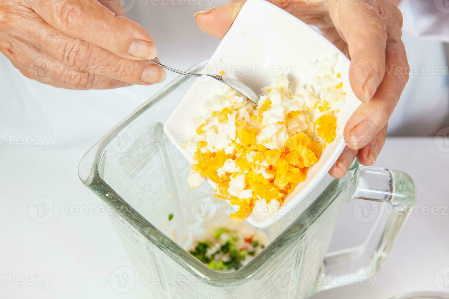 Preparation of the spicy peanut sauce to accompany the traditional patties from the region of Cauca in Colombia, called empanadas de pipian photo