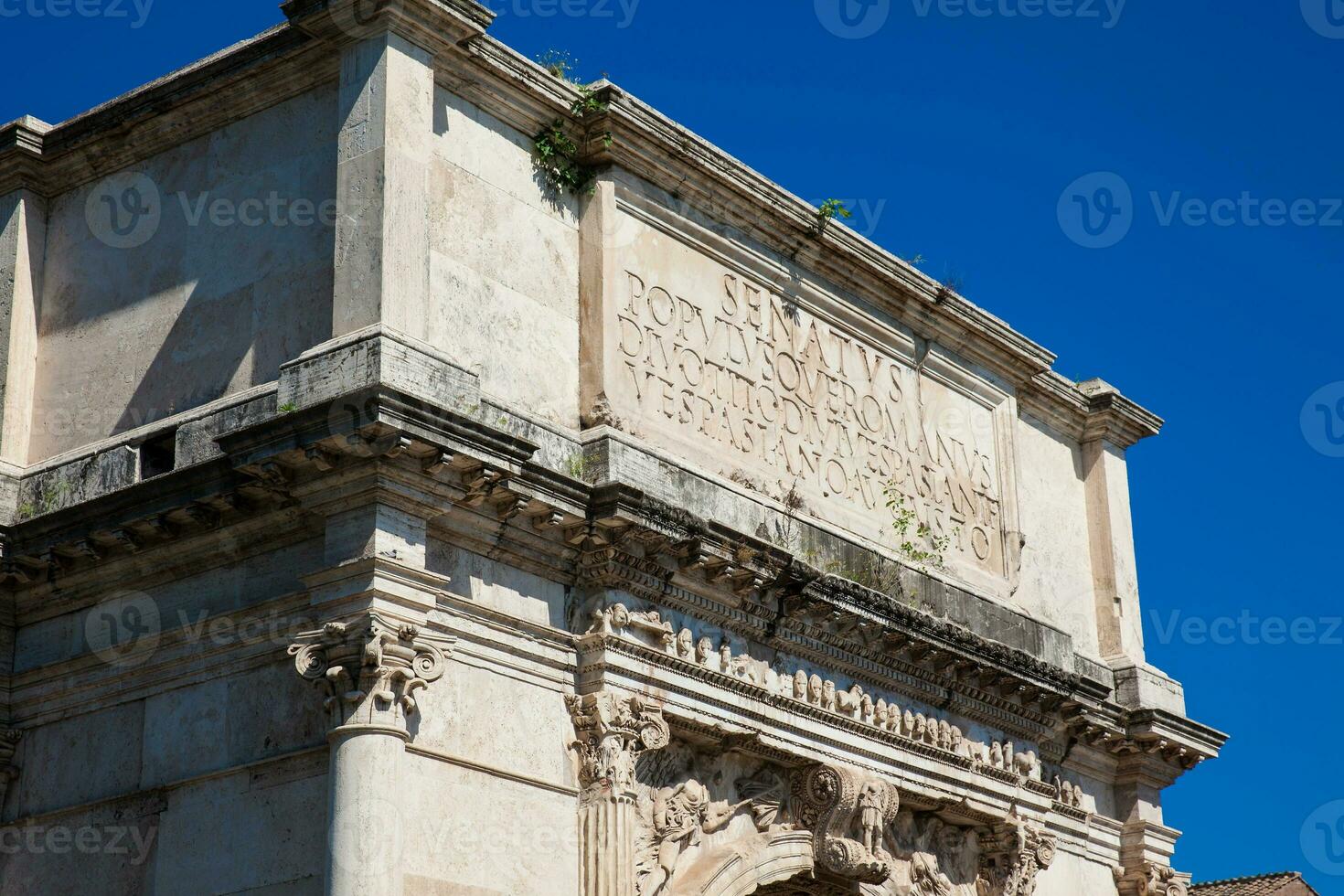 The Arch of Constantine a triumphal arch in Rome, situated between the Colosseum and the Palatine Hill built on the year 315 AD photo