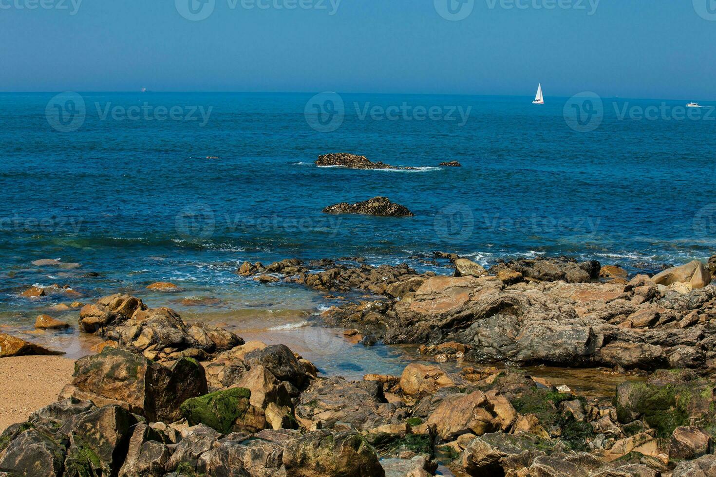 Sunny day at the beautiful coastline and beaches at Porto city in Portugal photo