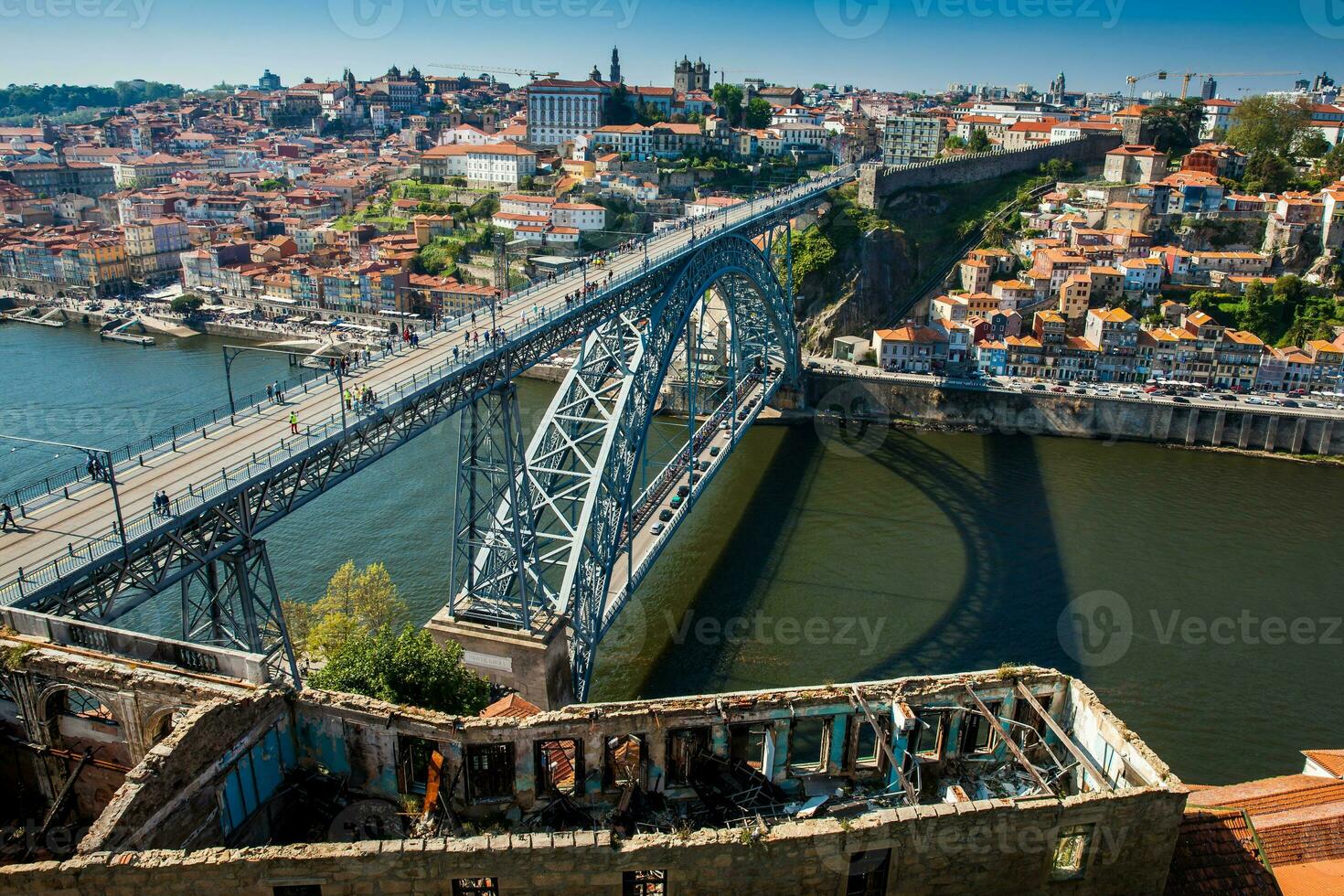 View of Porto city and the Dom Luis I Bridge a metal arch bridge over the Douro River photo