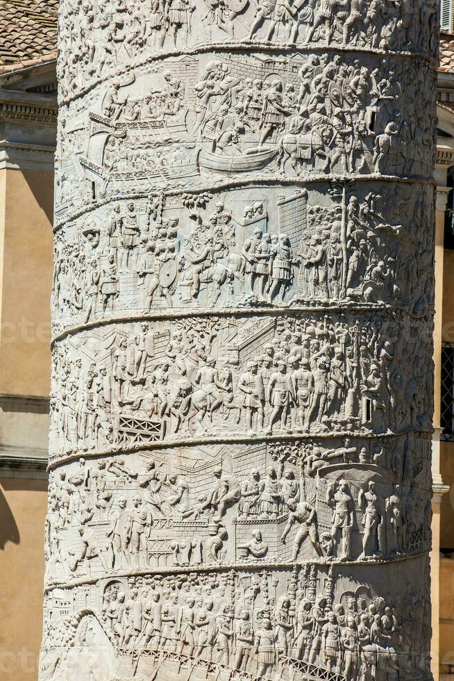 Detail of the Roman triumphal column of Trajan built on the year 107 AD photo