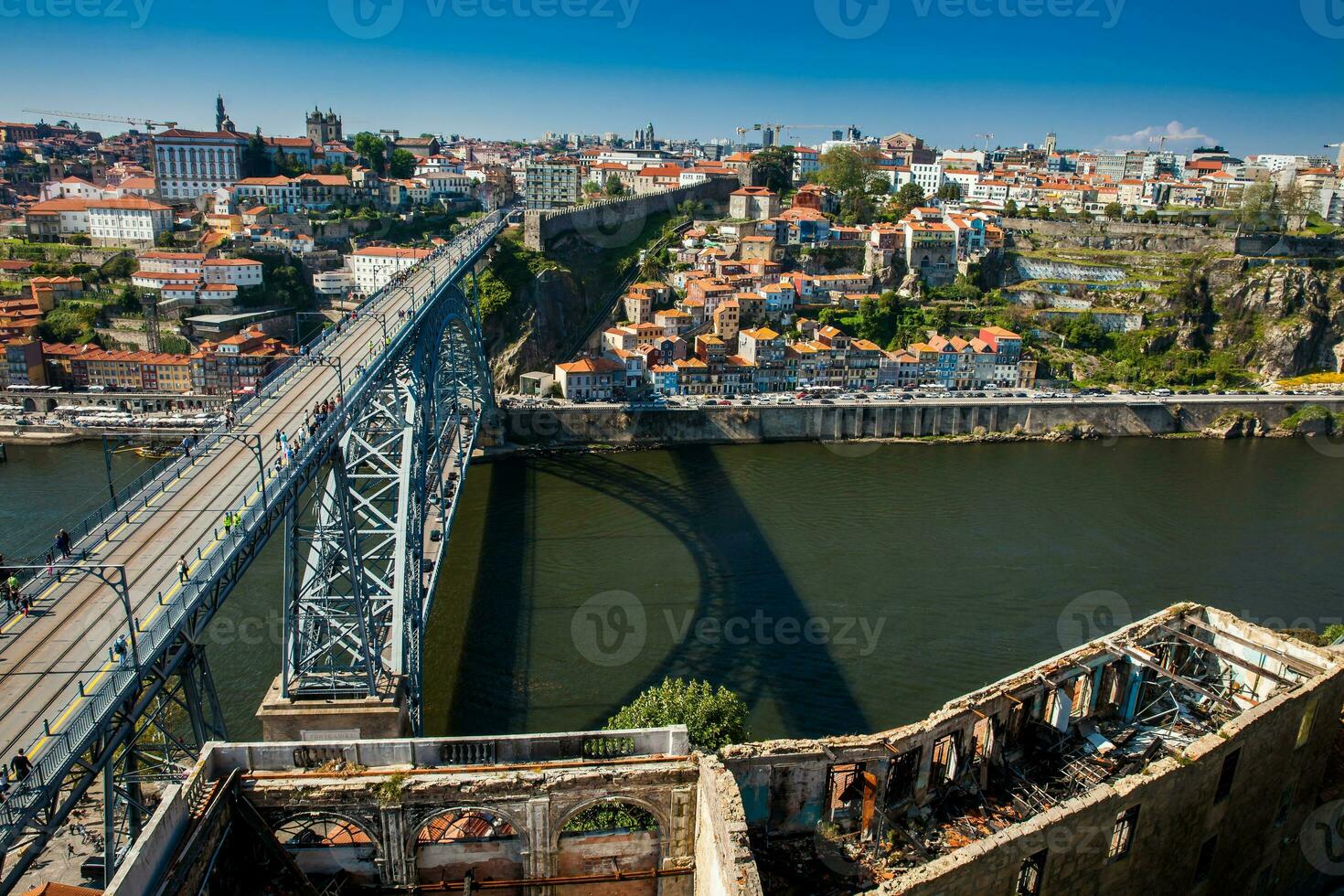View of Porto city and the Dom Luis I Bridge a metal arch bridge over the Douro River photo