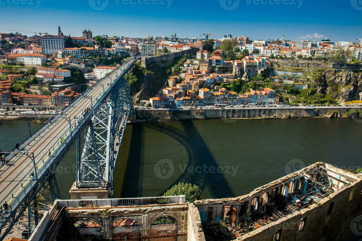 View of Porto city and the Dom Luis I Bridge a metal arch bridge over the Douro River photo