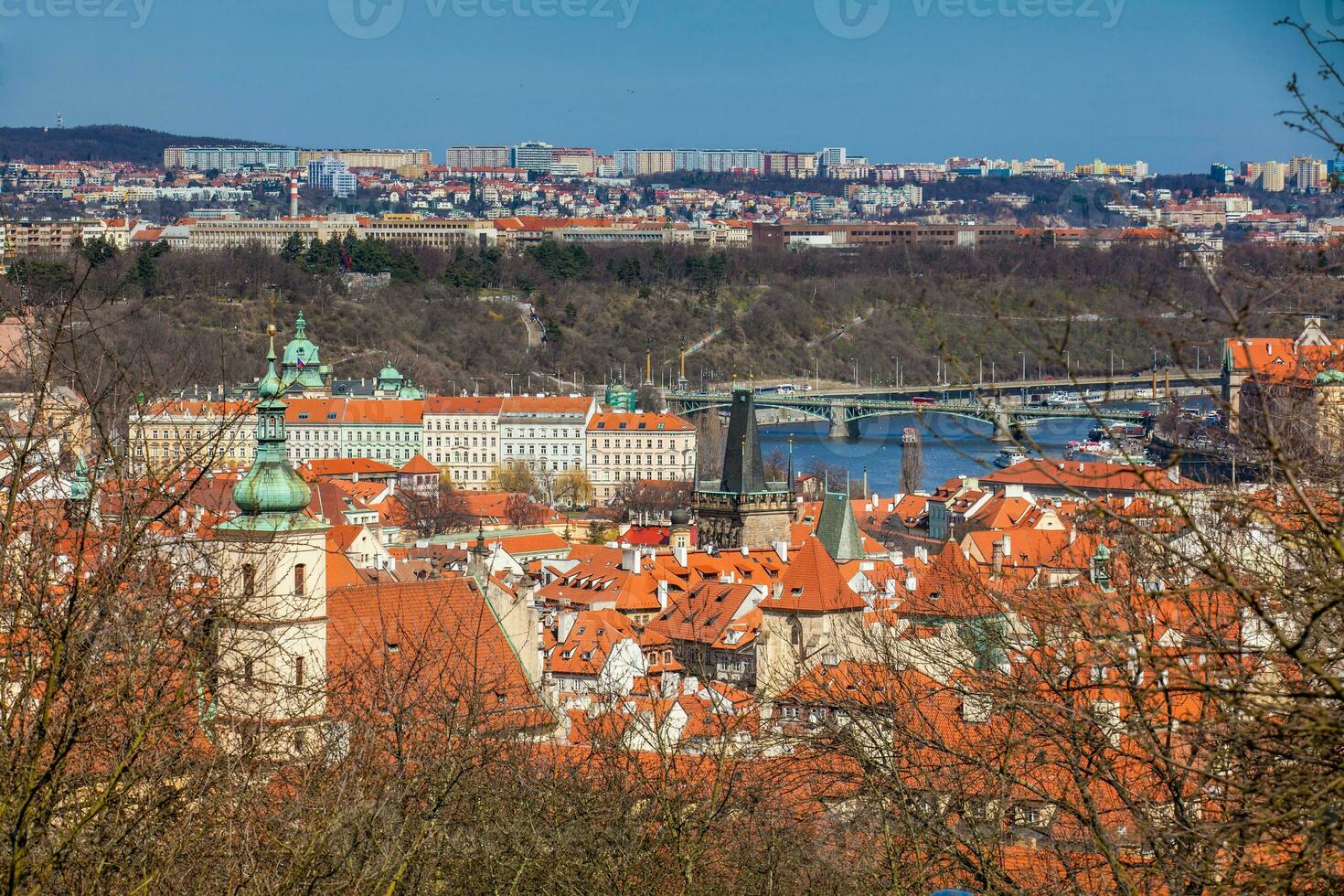 Manes Bridge and Prague old town seen from the Petrin hill photo