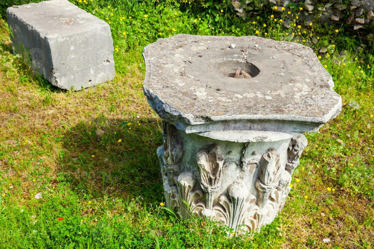 Remains of columns of the ancient buildings at the Roman Forum in Rome photo