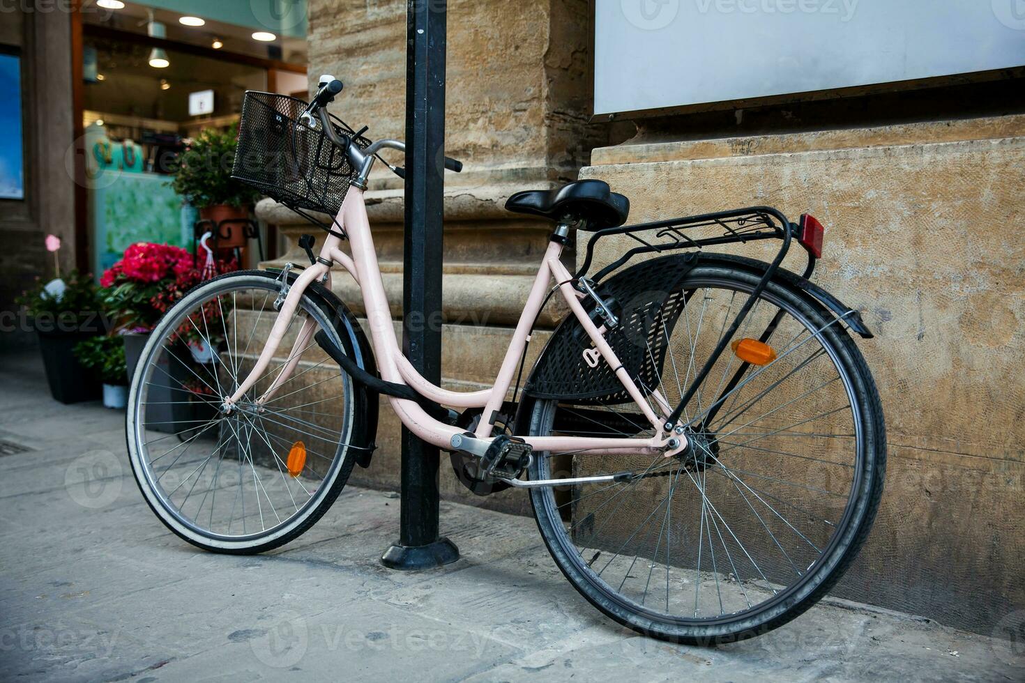 Bicycle parked at the beautiful streets of Florence old city photo