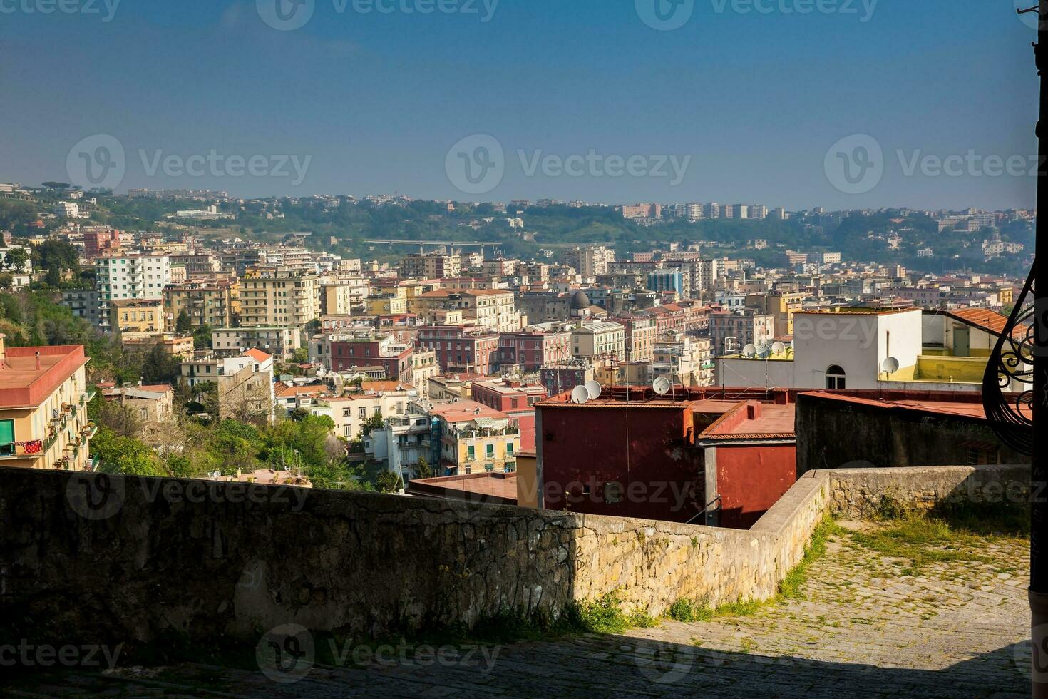 View of Naples city from the Pedamentina di San Martino a complex system of tiered descents with 414 steps that connects the Certosa di San Martino to the historical center of the city photo