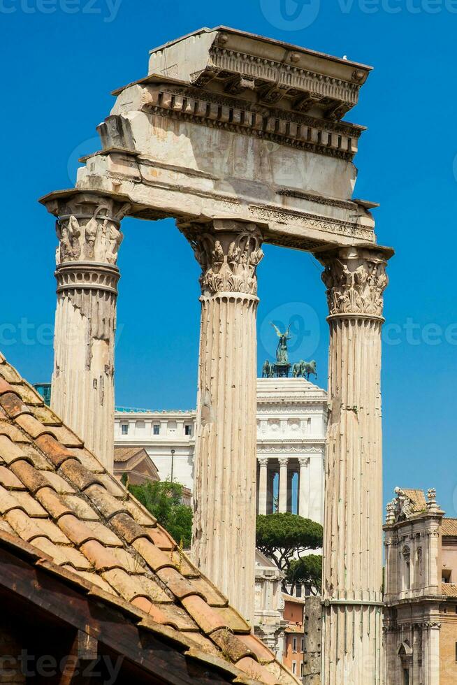 Remains of the Temple of Castor and Pollux or the Dioscuri at the Roman Forum in Rome photo