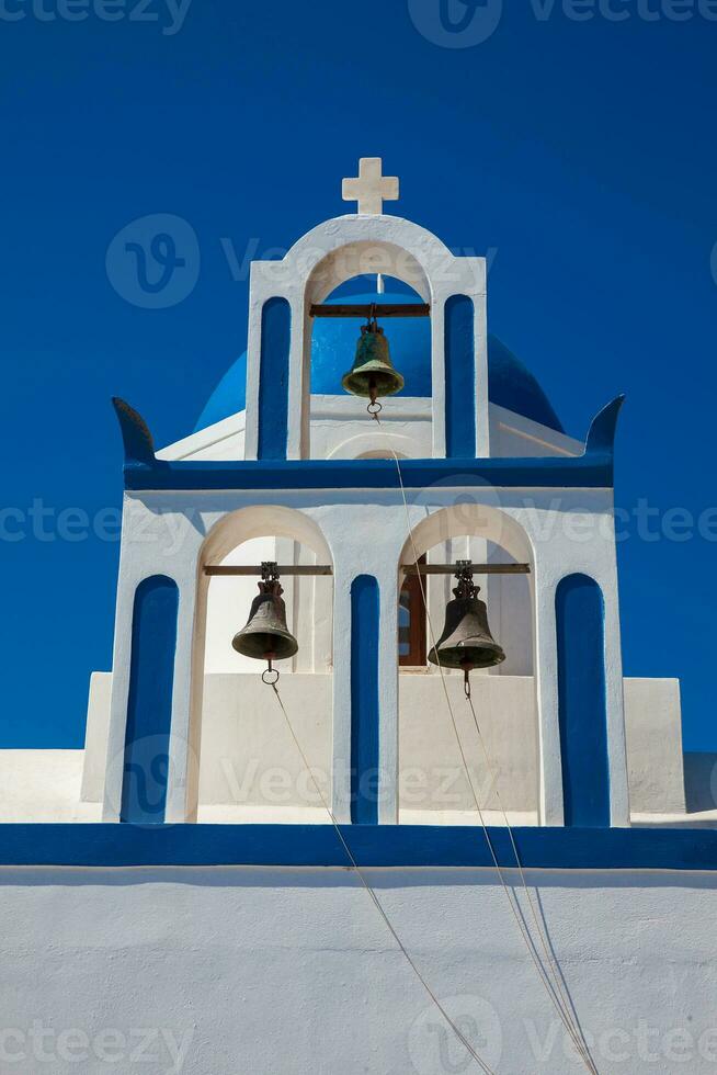 The Profitis Ilias church located next to walking path Number 9 between Fira and Oia in Santorini Island photo
