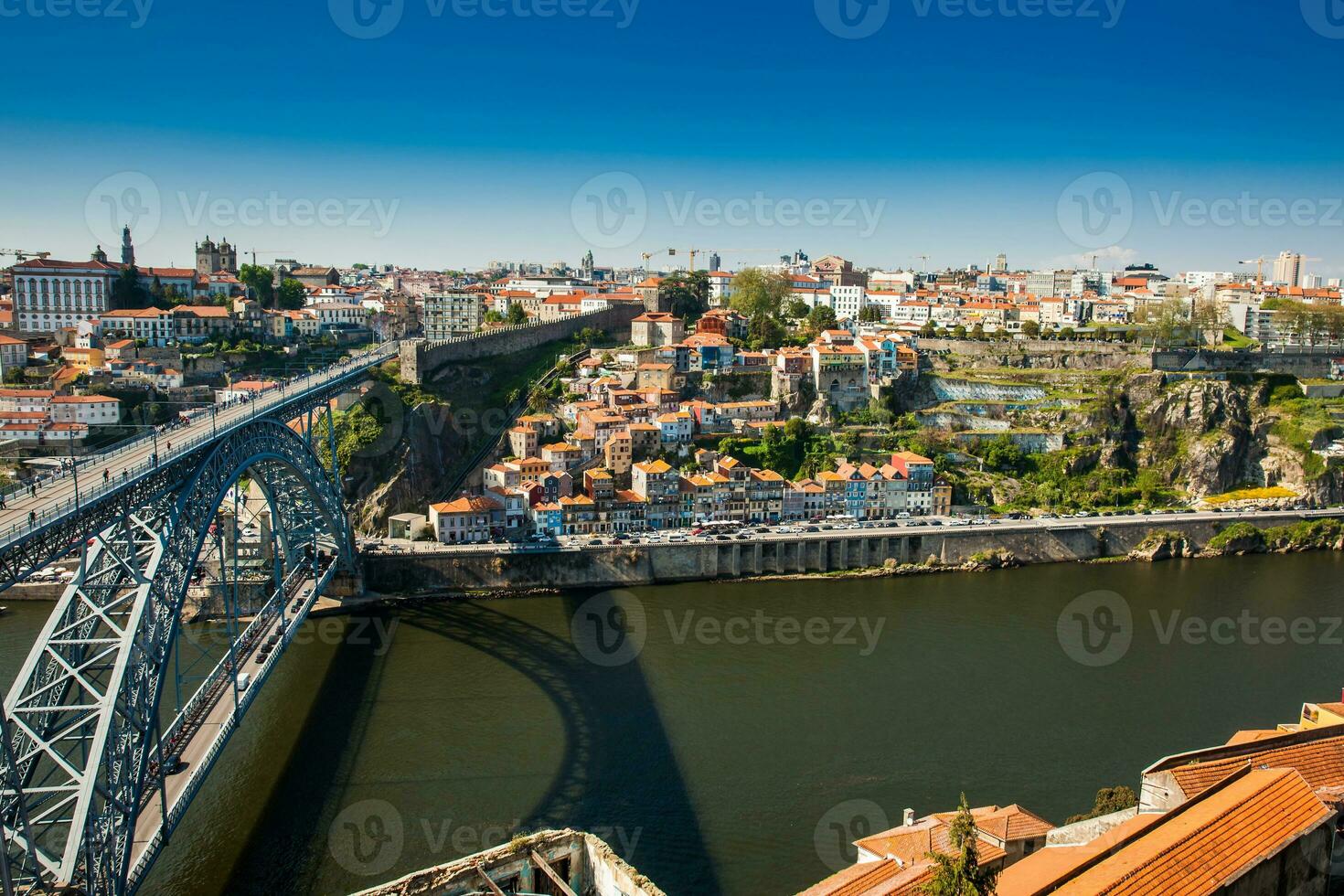 View of Porto city and the Dom Luis I Bridge a metal arch bridge over the Douro River photo