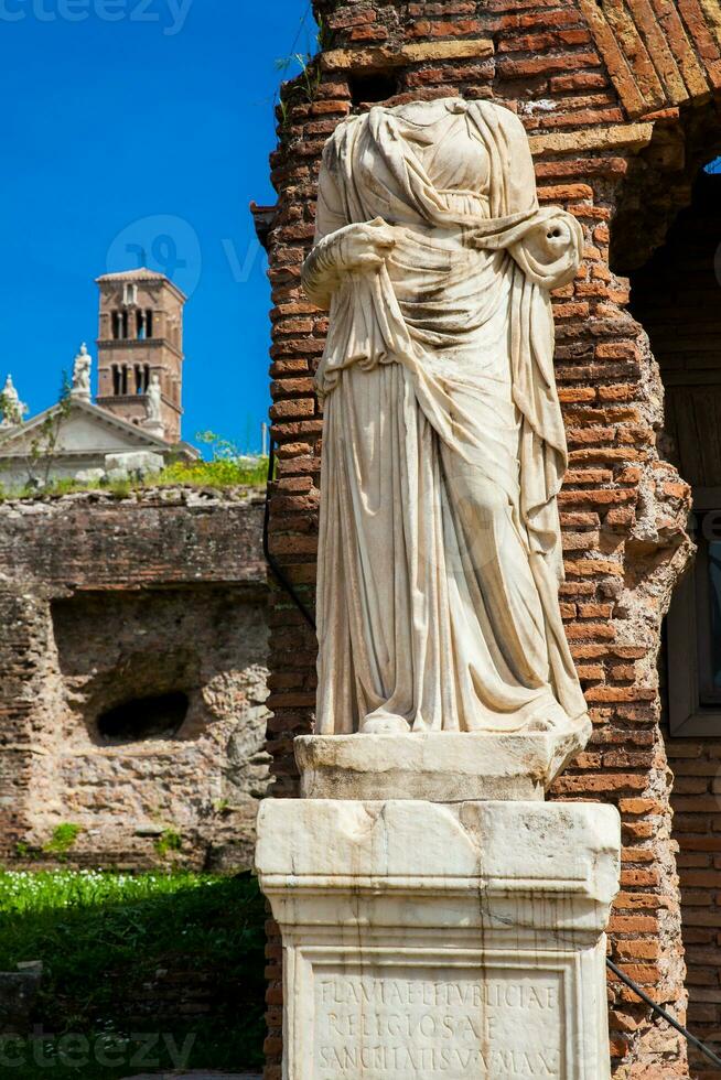 Ancient ruins of the House of the Vestal Virgins at the Roman Forum in Rome photo