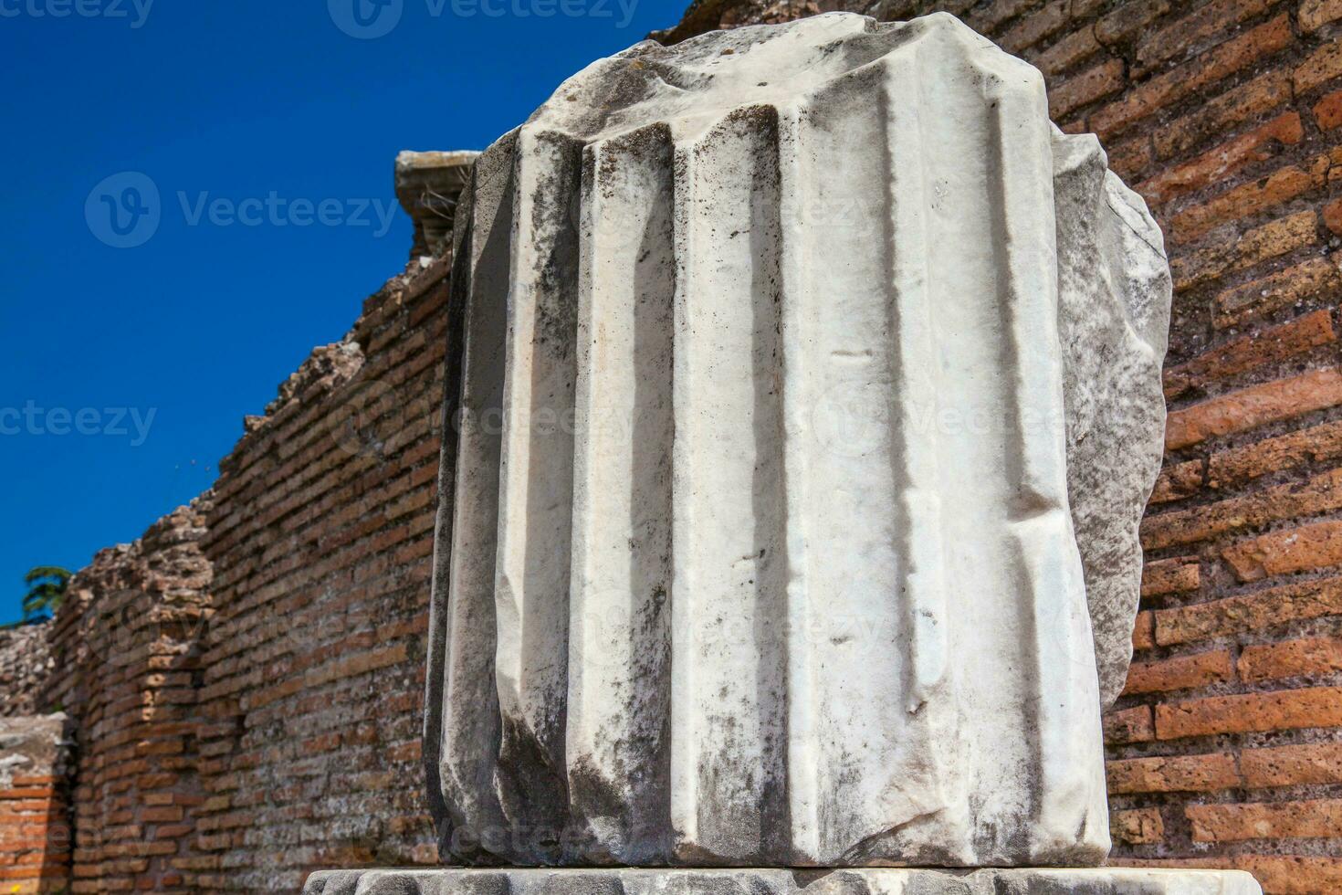 Remains of columns of the ancient buildings at the Roman Forum in Rome photo