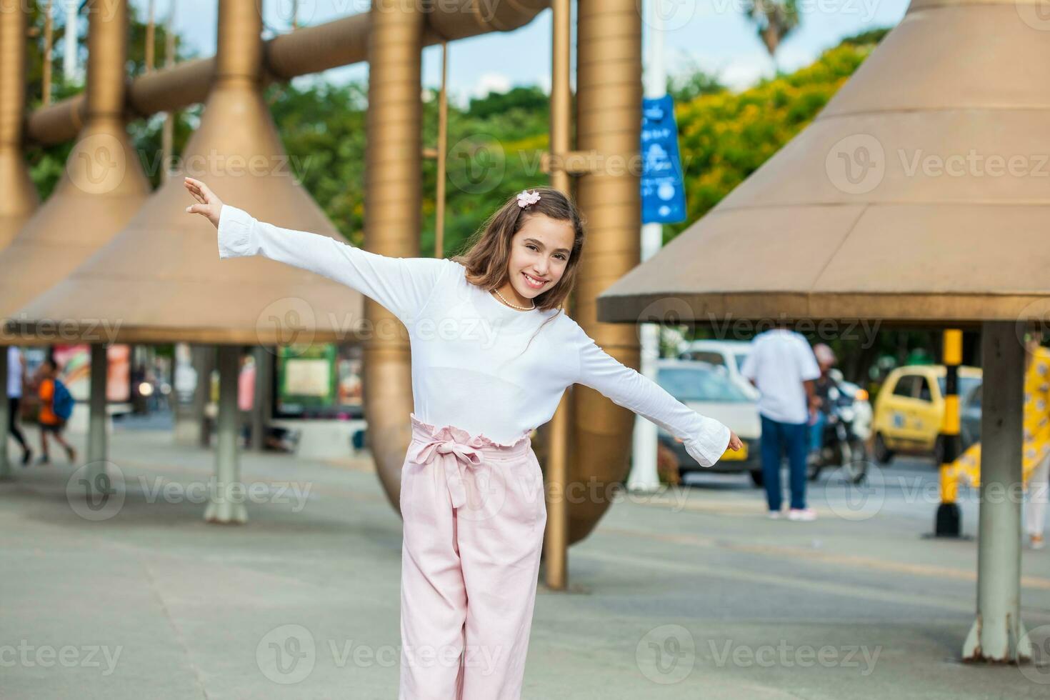 Beautiful young girl at the Jairo Varela Square in the city of Cali in Colombia photo