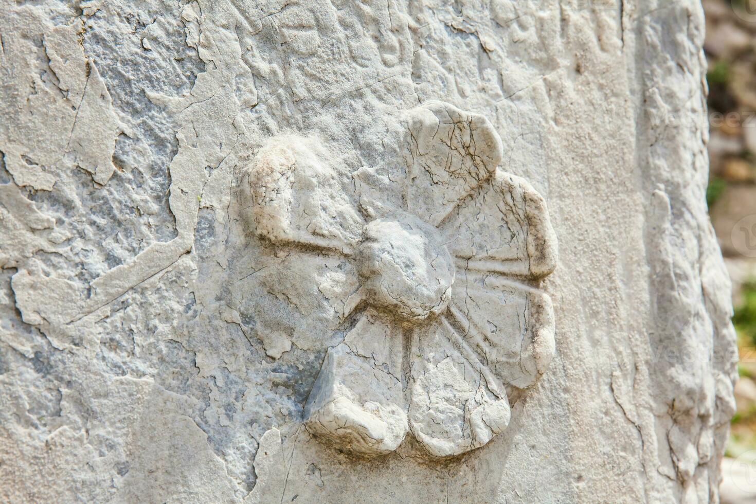 Detail of the carvings at the ancient ruins on the Roman Agora located to the north of the Acropolis in Athens photo