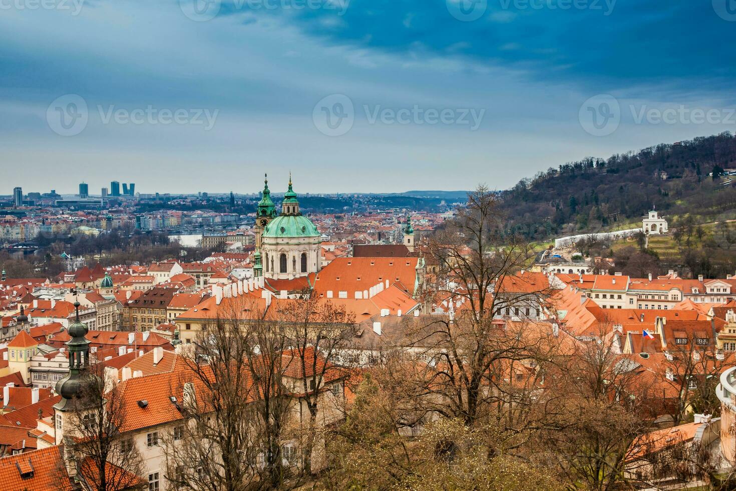 Petrin hill and the beautiful Prague city old town seen form the Prague Castle viewpoint in an early spring day photo