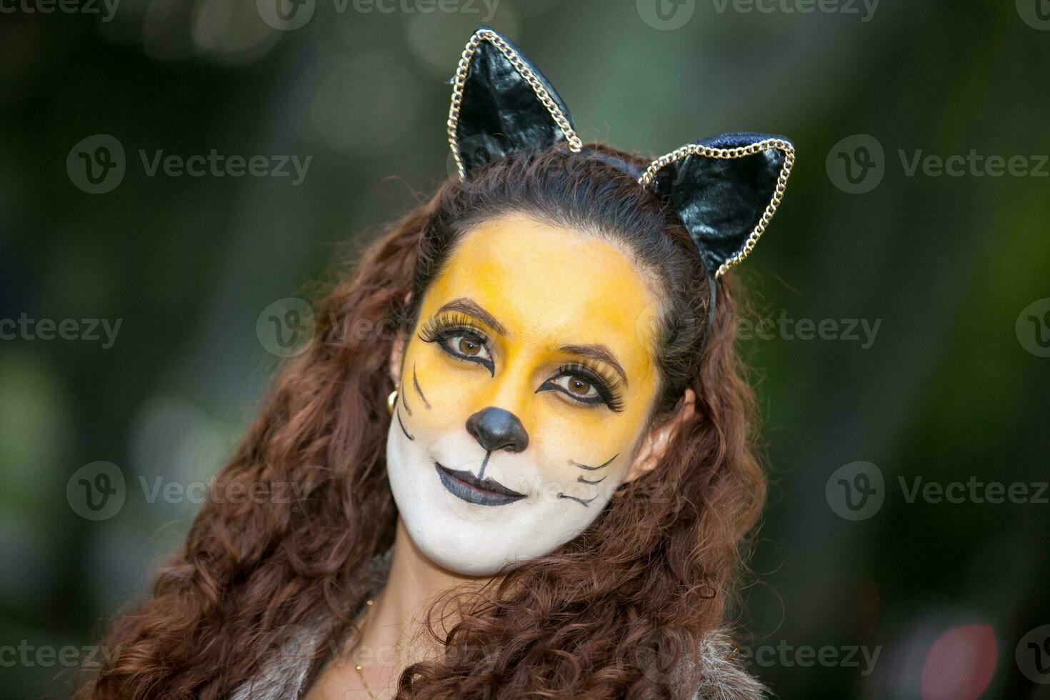 Beautiful young woman wearing a wolf costume. Real family having fun