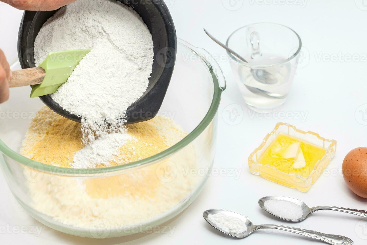 Pandebono preparation. Adding cassava starch for pandebono dough photo