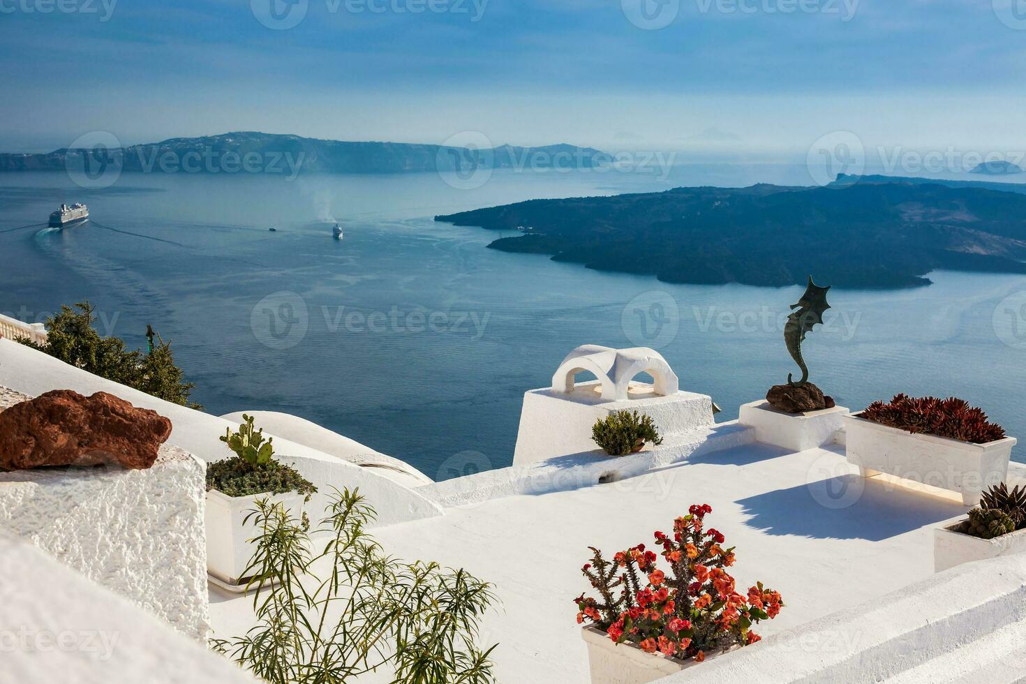 Details of the beautiful architecture of Santorini Island and the view of the Cyclades photo