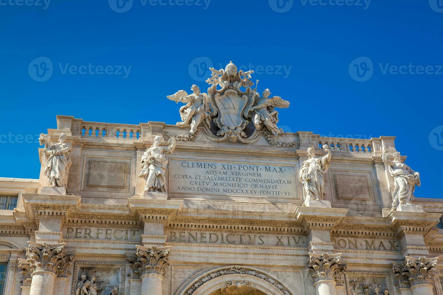 Papal coat of arms at the Trevi Fountain designed by Italian architect Nicola Salvi and completed by Giuseppe Pannini  in 1762 photo