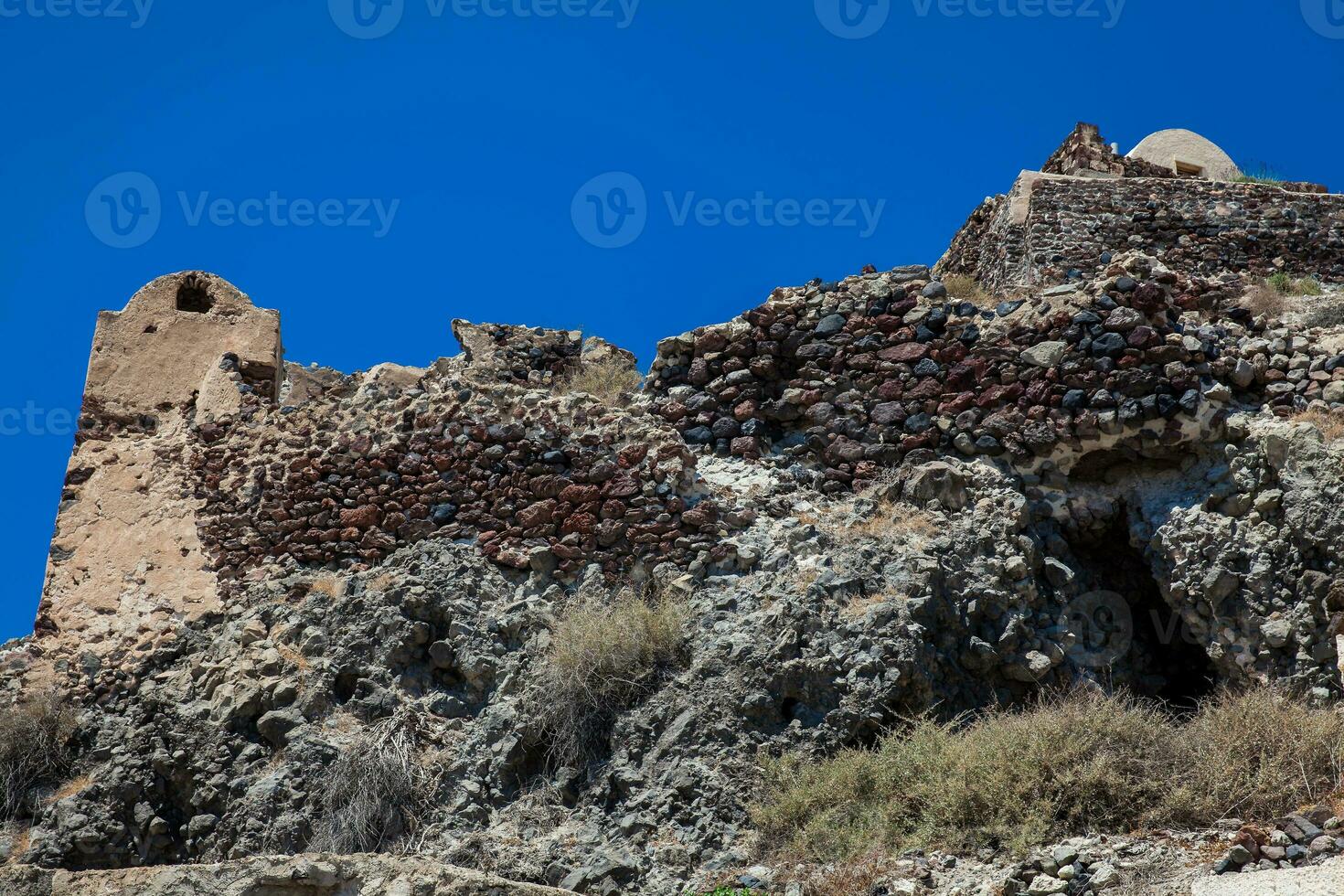 Ruins of the Castle of Akrotiri also known as Goulas or La Ponta, a former Venetian castle on the island of Santorini photo