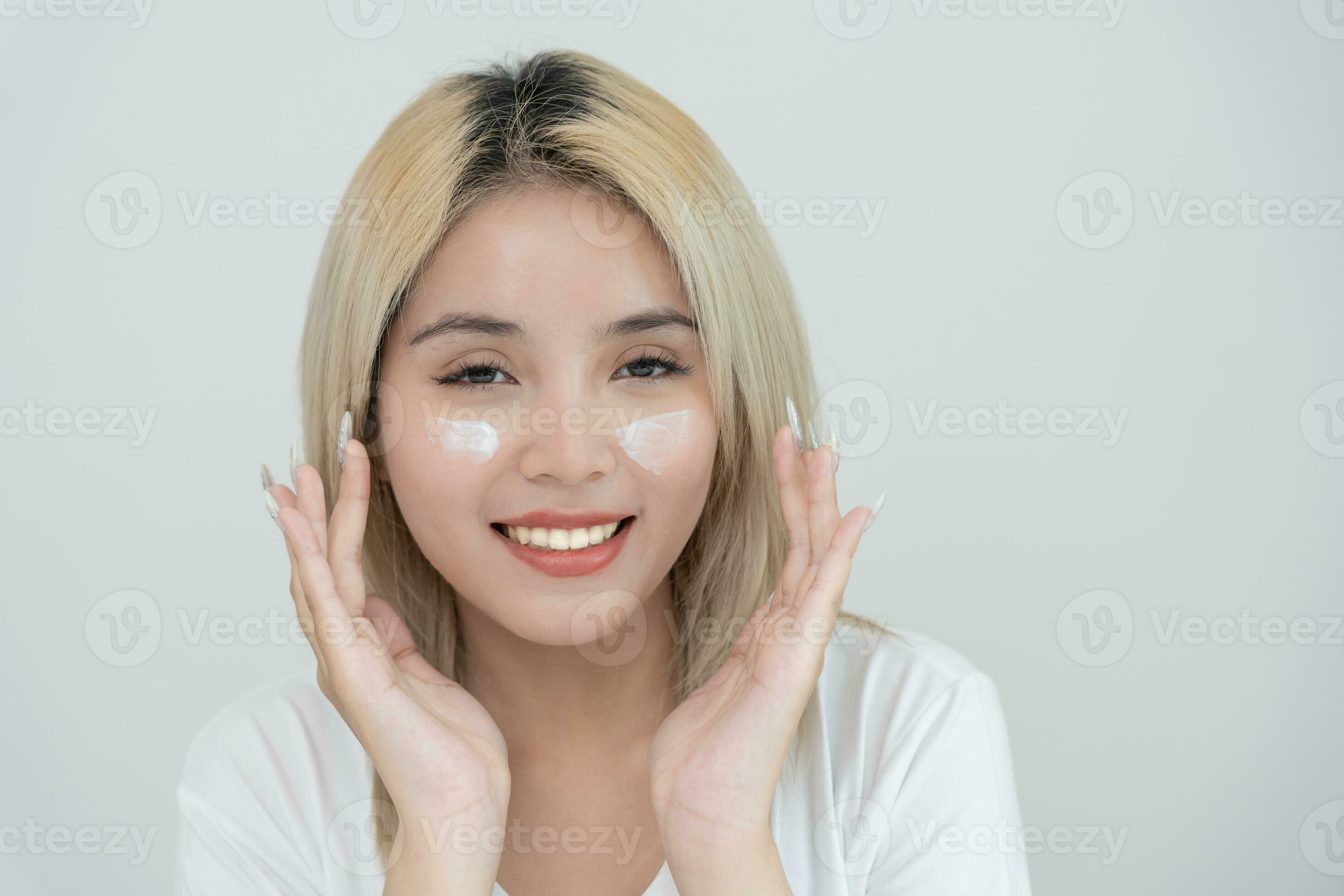 Beautiful Asian woman sit in front of a mirror. face of a healthy woman