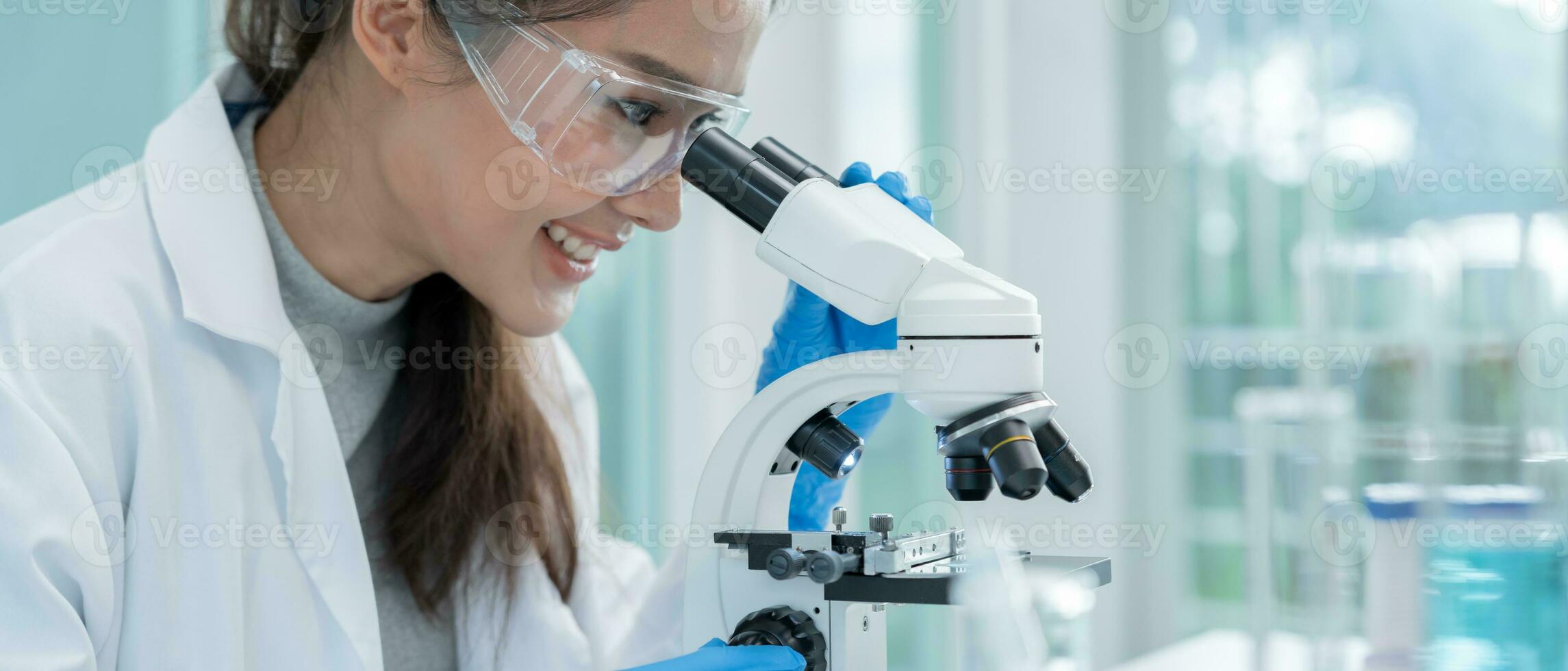 Scientist analyze biochemical samples in advanced scientific laboratory. Medical professional use microscope look microbiological developmental of viral. Biotechnology research in science lab. photo