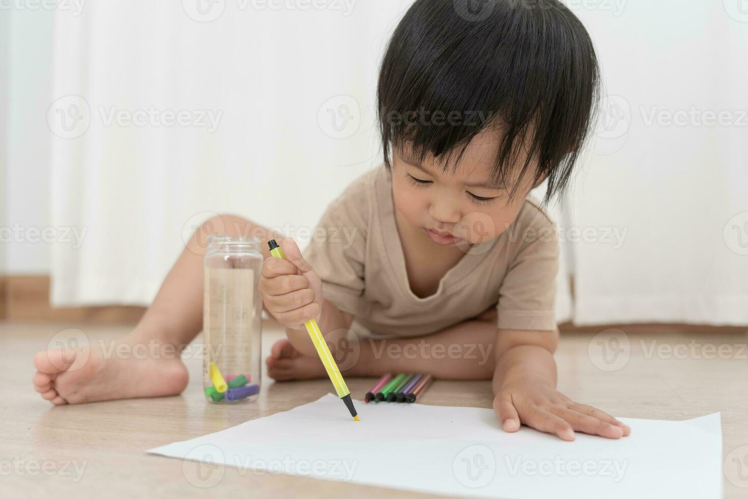 Happy Asia children playing learning paint on paper. Activity, development, IQ, EQ, meditation, brain, muscles, essential skills, family having fun spending time together. Holiday photo