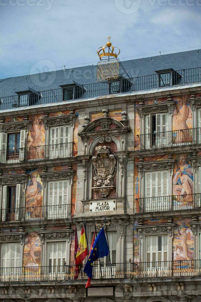 Beautiful antique buildings around Plaza Mayor at Madrid city center photo