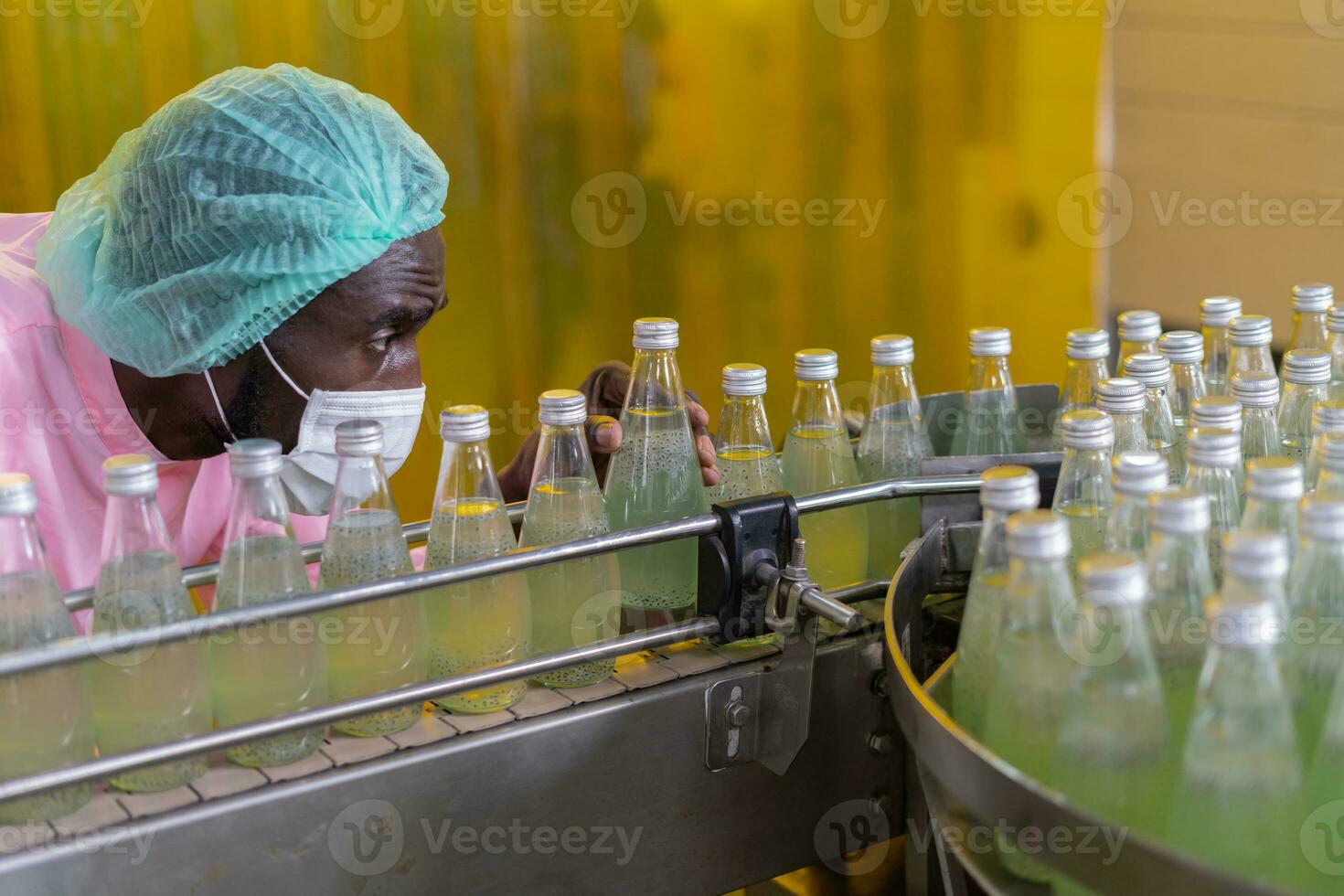 quality supervisor or food or beverages technician inspection about condition control food or beverages before send product to the customer. Production leader recheck machine and productivity. photo