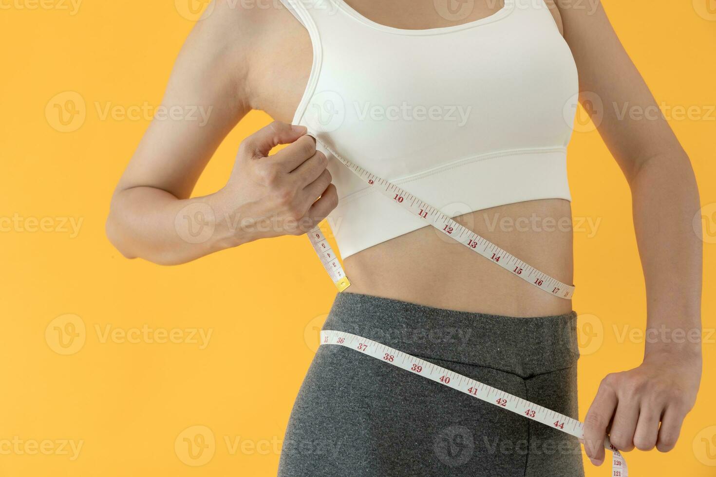 Diet and dieting. Beauty slim female body use tape measure. Woman in  exercise clothes achieves weight loss goal for healthy life, crazy about  thinness, thin waist, nutritionist. 30577331 Stock Photo at Vecteezy