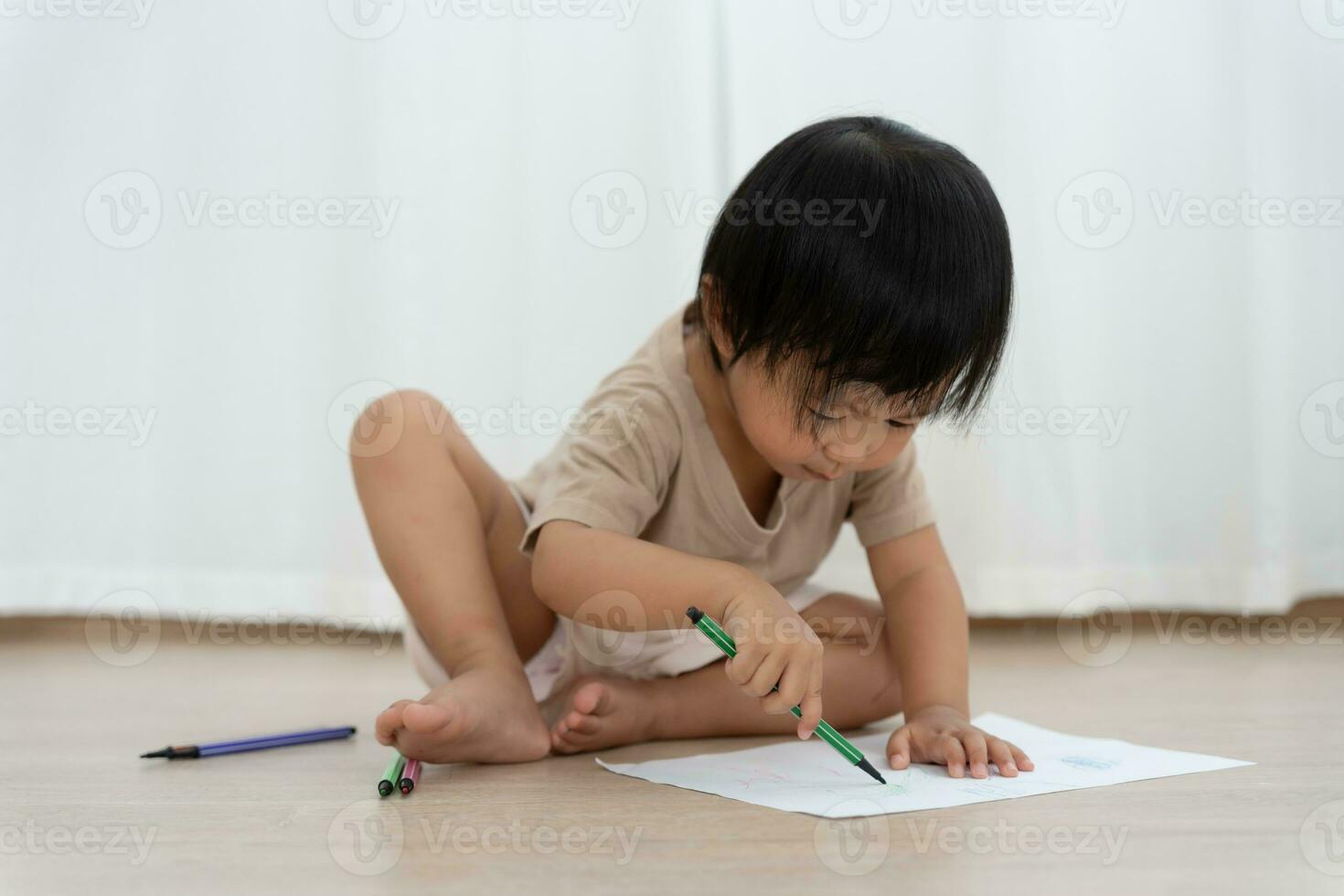 Happy Asia children playing learning paint on paper. Activity, development, IQ, EQ, meditation, brain, muscles, essential skills, family having fun spending time together. Holiday photo