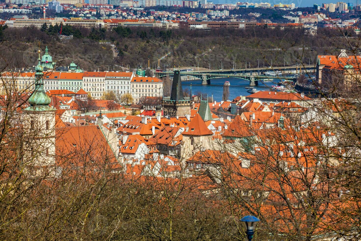 Manes Bridge and Prague old town seen from the Petrin hill photo