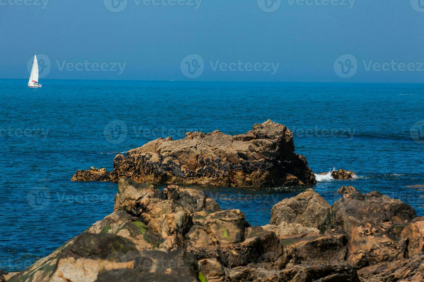 Sunny day at the beautiful coastline and beaches at Porto city in Portugal photo