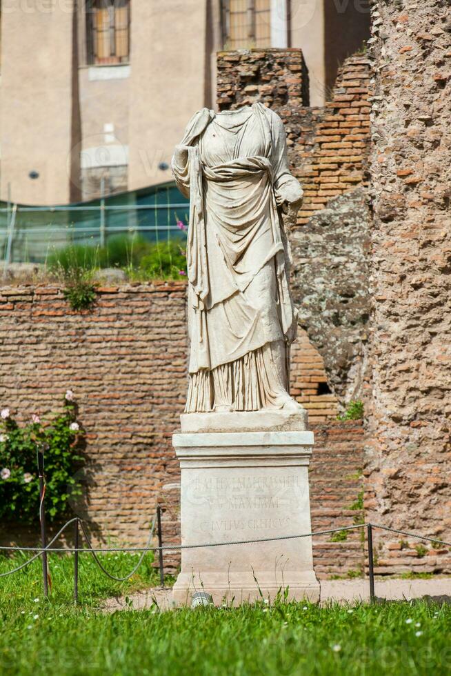 Ancient ruins of the House of the Vestal Virgins at the Roman Forum in Rome photo