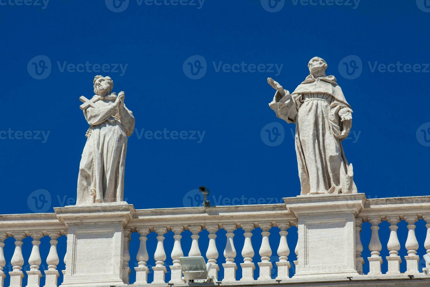 Detail of the statues of saints that crown the colonnades of St. Peter Square built on 1667 on