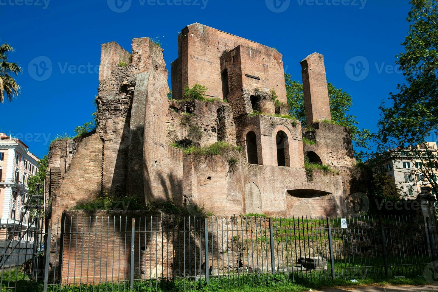 Ruins of an antique monumental fountain called Trofei di Mario built in 226 AD and  located at Piazza Vittorio Emanuele II in Rome photo
