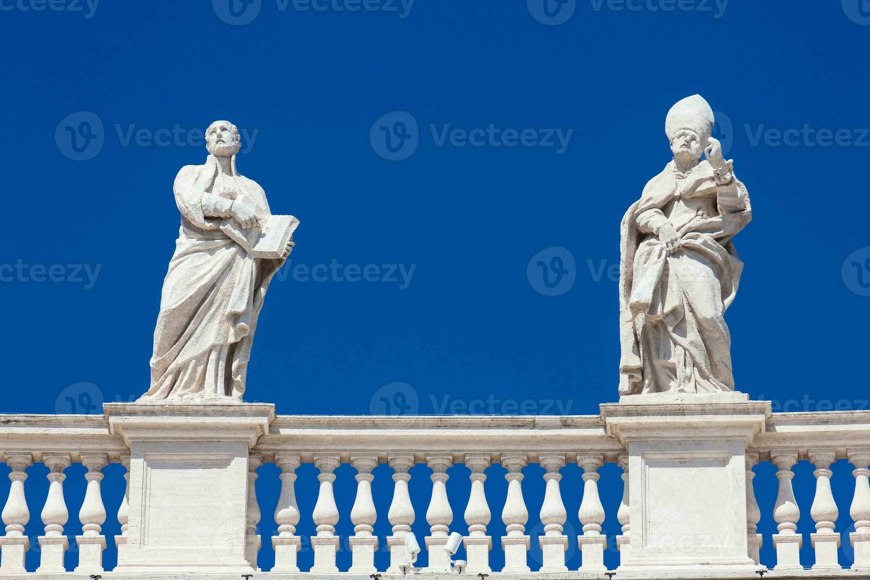 Detail of the statues of saints that crown the colonnades of St. Peter Square built on 1667 on