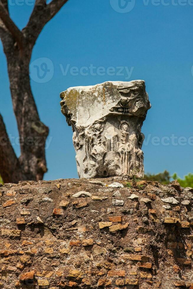 Remains of columns of the ancient buildings at the Roman Forum in Rome photo