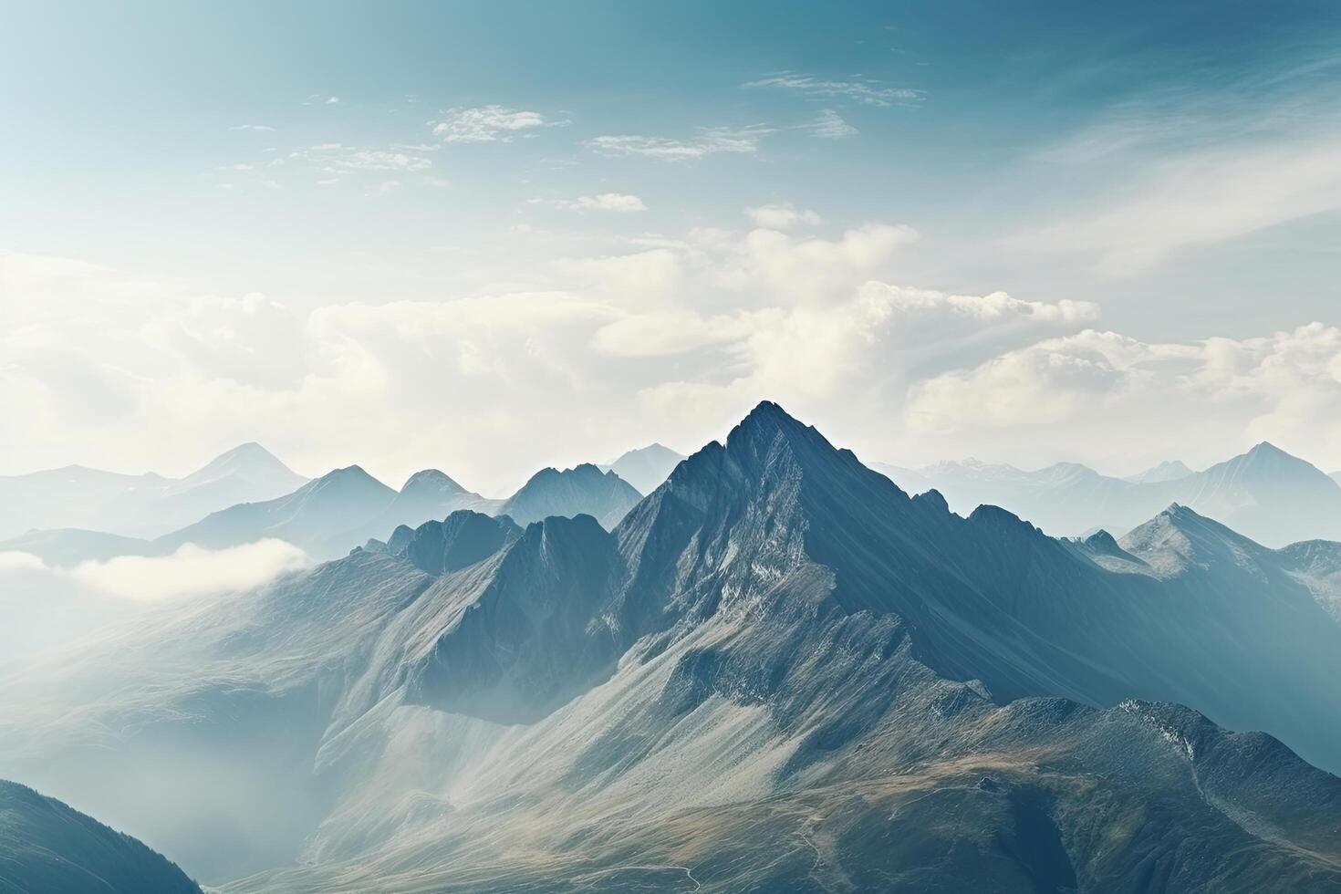 high mountain landscape images covered with snow and clouds photo
