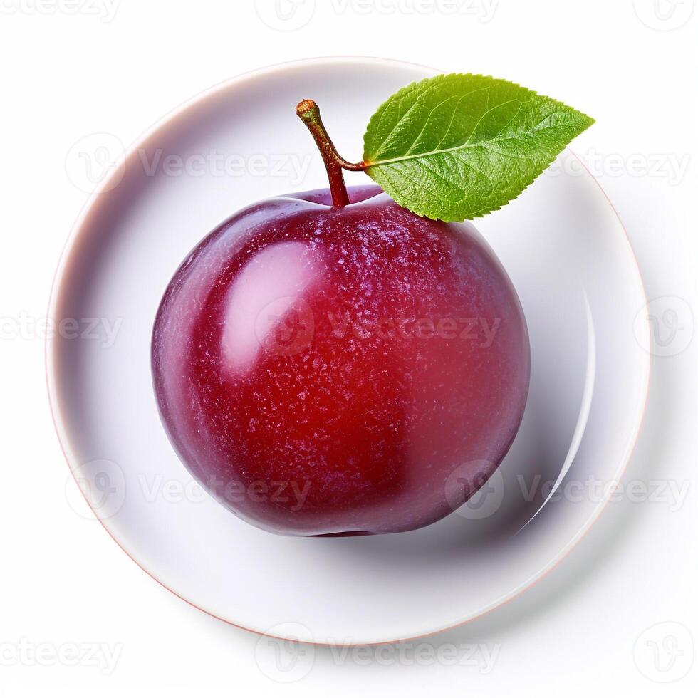 Juicy delicious plum lies on beautiful plate, photo