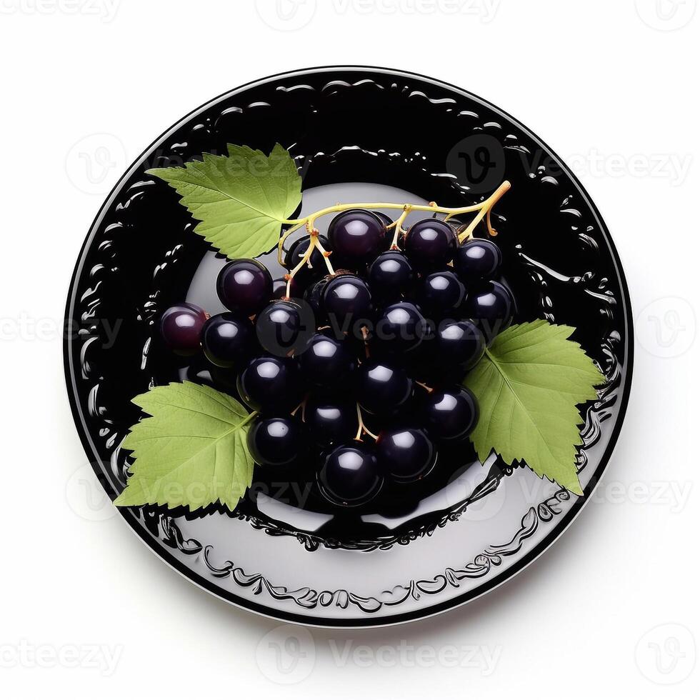 Juicy delicious blackcurrant lies on beautiful plate, photo