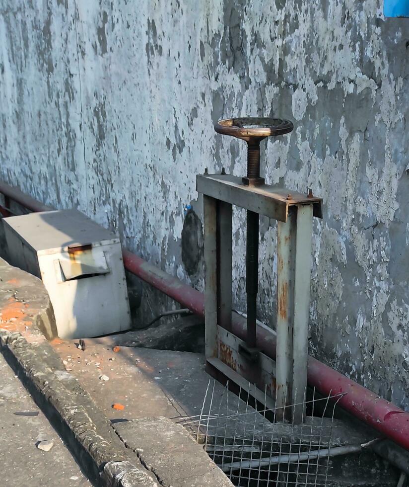 large rusty faucet for water access photo