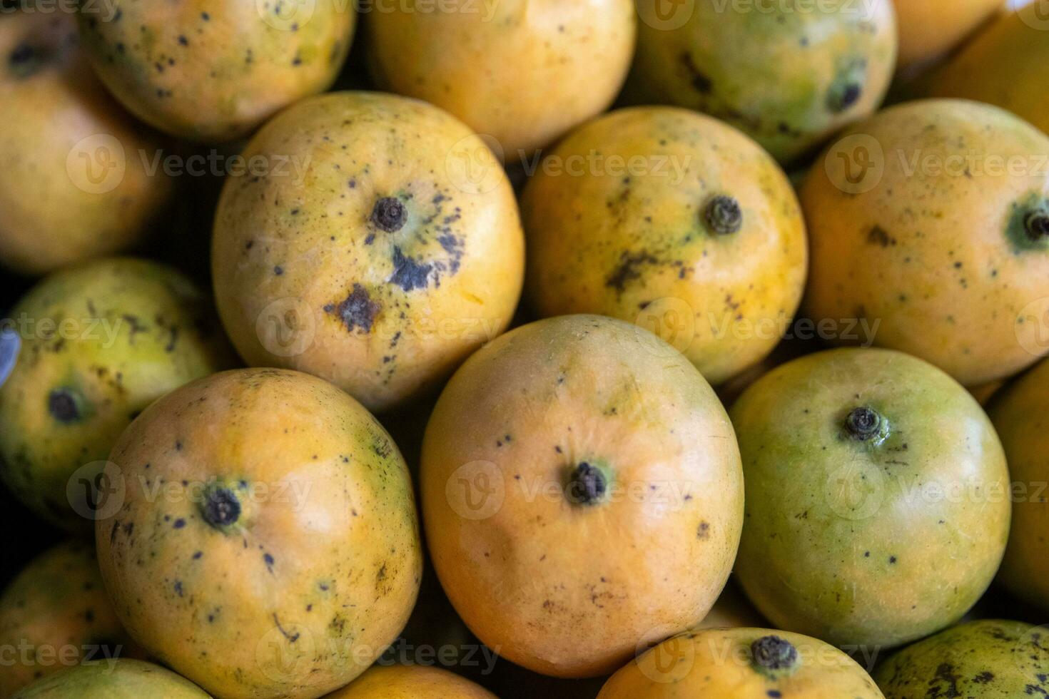 Bunch of Mangos Stacked photo